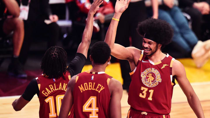 Feb 19, 2022; Cleveland, OH, USA; Team Cavs player Darius Garland (10) and player Evan Mobley (4) and player Jarrett Allen (31) celebrate after a play in the Taco Bell Skills Challenge against Team Rooks and Team Antetokounmpo during the 2022 NBA All-Star Saturday Night at Rocket Mortgage Field House. Mandatory Credit: Ken Blaze-USA TODAY Sports