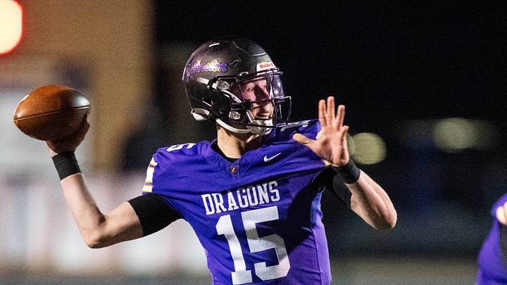 Johnston's Trevin Helming (15) looks to the corner of the end zone for an open receiver on Nov. 7, 2025, at Johnston High School. Johnston's Trevin Helming (15) looks to the corner of the end zone for an open receiver on Nov. 7, 2025, at Johnston High School.