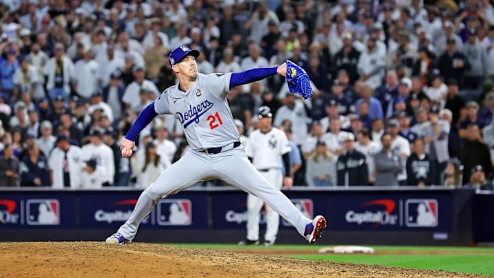 Oct 30, 2024; New York, New York, USA; Los Angeles Dodgers pitcher Walker Buehler (21) pitches during the ninth inning against the New York Yankees in game four of the 2024 MLB World Series at Yankee Stadium. 