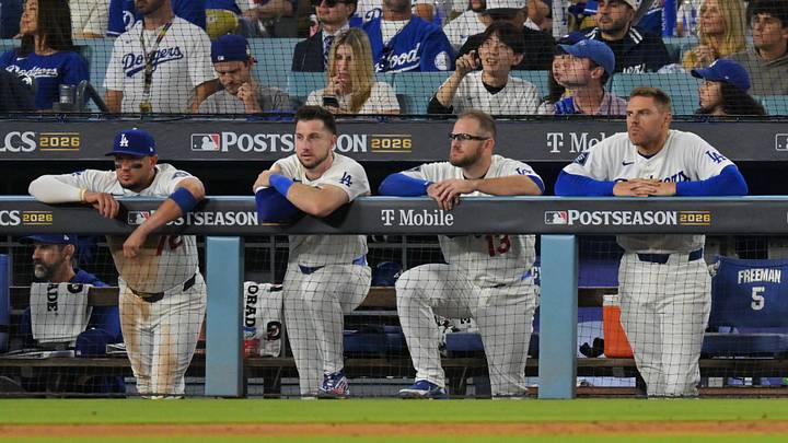 Oct 14, 2026; Los Angeles, California, USA; Los Angeles Dodgers second baseman Miguel Rojas (72) and outfielder Kyle Tucker (23) and third baseman Max Muncy (13) and first baseman Freddie Freeman (5) look on from the dugout during the eighth inning against the Milwaukee Brewers in game three of the NLCS for the 2026 MLB Playoffs at Uniqlo Field at Dodger Stadium. Mandatory Credit: Jayne Kamin-Oncea-Imagn Images Oct 14, 2026; Los Angeles, California, USA; Los Angeles Dodgers second baseman Miguel Rojas (72) and outfielder Kyle Tucker (23) and third baseman Max Muncy (13) and first baseman Freddie Freeman (5) look on from the dugout during the eighth inning against the Milwaukee Brewers in game three of the NLCS for the 2026 MLB Playoffs at Uniqlo Field at Dodger Stadium. Mandatory Credit: Jayne Kamin-Oncea-Imagn Images