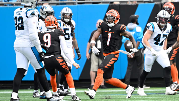 Sep 29, 2024; Charlotte, North Carolina, USA; Cincinnati Bengals wide receiver Ja'Marr Chase (1) celebrates with quarterback Joe Burrow (9) after a touchdown catch in the second quarter at Bank of America Stadium. Mandatory Credit: Bob Donnan-Imagn Images Sep 29, 2024; Charlotte, North Carolina, USA; Cincinnati Bengals wide receiver Ja'Marr Chase (1) celebrates with quarterback Joe Burrow (9) after a touchdown catch in the second quarter at Bank of America Stadium. Mandatory Credit: Bob Donnan-Imagn Images
