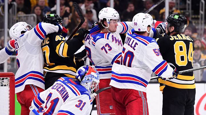Sep 29, 2026; Boston, Massachusetts, USA;  Boston Bruins center Mark Kastelic (47) grabs a hold of New York Rangers center Matt Rempe (73) during the third period at TD Garden. Mandatory Credit: Bob DeChiara-Imagn Images