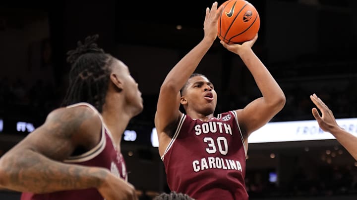 Feb 25, 2025; Columbia, Missouri, USA; South Carolina Gamecocks forward Collin Murray-Boyles (30) shoots over Missouri Tigers guard Caleb Grill (31) during the second half at Mizzou Arena. Mandatory Credit: Denny Medley-Imagn Images