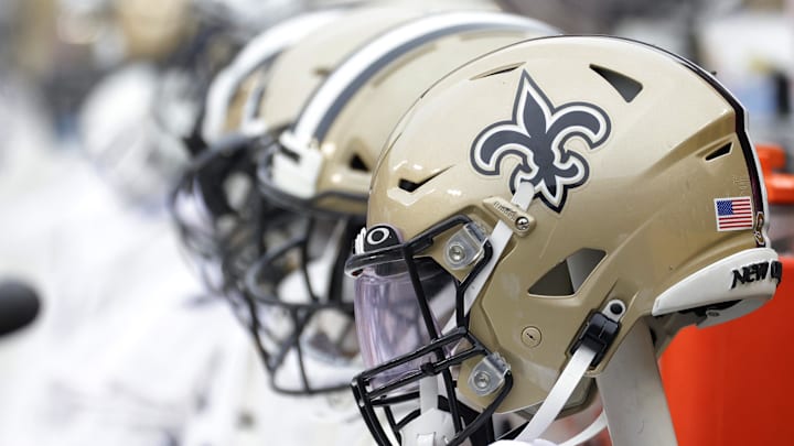 Oct 10, 2021; Landover, Maryland, USA; New Orleans Saints players' helmets on the bench against the Washington Football Team at FedExField. Mandatory Credit: Geoff Burke-Imagn Images