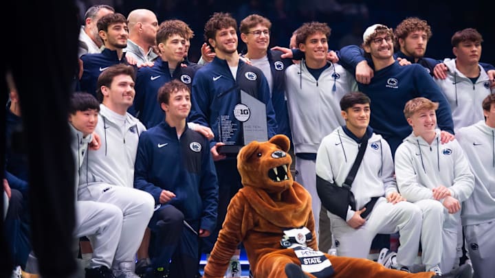 The Penn State Nittany Lions wrestling team celebrates winning its sixth consecutive Big Ten regular-season title.