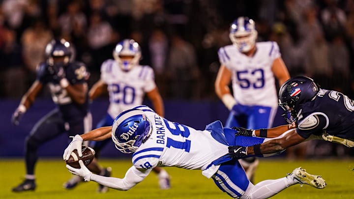 Nov 8, 2025; East Hartford, Connecticut, USA; Duke Blue Devils wide receiver Cooper Barkate (18) makes the catch against the UConn Huskies in the second half at Pratt & Whitney Stadium at Rentschler Field. Mandatory Credit: David Butler II-Imagn Images