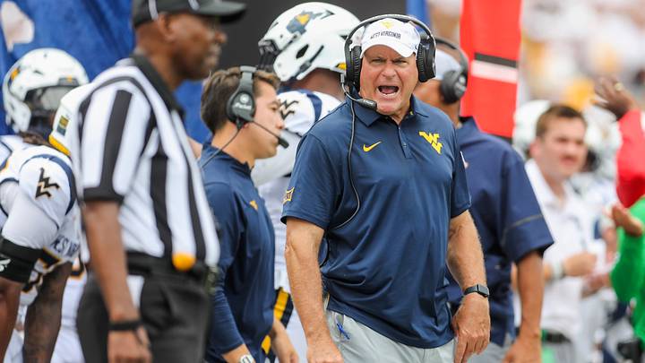 Sep 5, 2026; Morgantown, West Virginia, USA; West Virginia Mountaineers head coach Rich Rodriguez yells at an official during the third quarter against the Coastal Carolina Chanticleers at Milan Puskar Stadium. Mandatory Credit: Ben Queen-Imagn Images Sep 5, 2026; Morgantown, West Virginia, USA; West Virginia Mountaineers head coach Rich Rodriguez yells at an official during the third quarter against the Coastal Carolina Chanticleers at Milan Puskar Stadium. Mandatory Credit: Ben Queen-Imagn Images