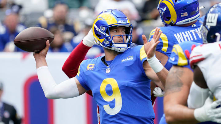 Oct 17, 2021; East Rutherford, New Jersey, USA;  
Los Angeles Rams quarterback Matthew Stafford (9) throws against the New York Giants in the 1st half at MetLife Stadium. Mandatory Credit: Robert Deutsch-Imagn Images