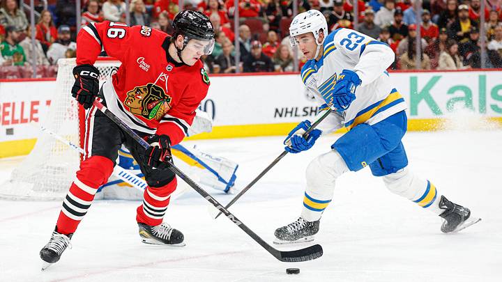 Apr 11, 2026; Chicago, Illinois, USA; Chicago Blackhawks center Anton Frondell (16) battles for the puck with St. Louis Blues defenseman Logan Mailloux (23) during the first period at United Center. Mandatory Credit: Kamil Krzaczynski-Imagn Images Apr 11, 2026; Chicago, Illinois, USA; Chicago Blackhawks center Anton Frondell (16) battles for the puck with St. Louis Blues defenseman Logan Mailloux (23) during the first period at United Center. Mandatory Credit: Kamil Krzaczynski-Imagn Images