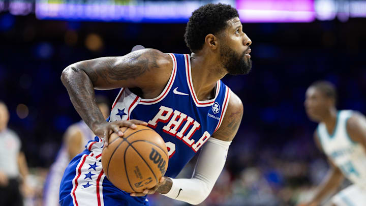 Nov 10, 2024; Philadelphia, Pennsylvania, USA; Philadelphia 76ers forward Paul George (8) controls the ball against the Charlotte Hornets during the fourth quarter at Wells Fargo Center. Mandatory Credit: Bill Streicher-Imagn Images