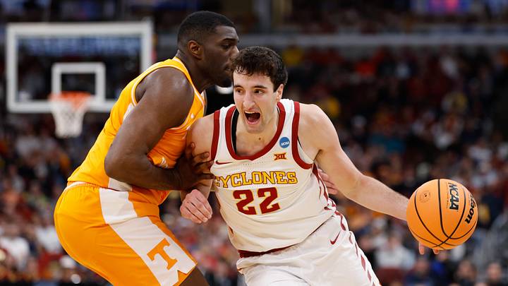 Mar 27, 2026; Chicago, IL, USA; Iowa State Cyclones forward Milan Momcilovic (22) drives the ball against Tennessee Volunteers forward Jaylen Carey (23) in the first half during a Sweet Sixteen game of the Midwest Regional of the men's 2026 NCAA Tournament at United Center. Mandatory Credit: Kamil Krzaczynski-Imagn Images