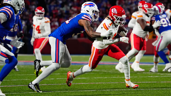 Nov 17, 2024; Orchard Park, New York, USA; Kansas City Chiefs wide receiver Xavier Worthy (1) runs with the ball against Buffalo Bills cornerback Rasul Douglas (31) after making a catch against the Buffalo Bills during the first half at Highmark Stadium