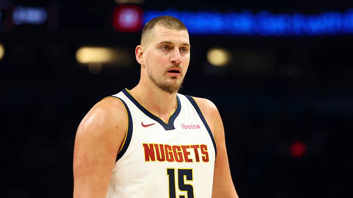Nov 29, 2025; Phoenix, Arizona, USA; Denver Nuggets center Nikola Jokic (15) against the Phoenix Suns at the Mortgage Matchup Center. Nov 29, 2025; Phoenix, Arizona, USA; Denver Nuggets center Nikola Jokic (15) against the Phoenix Suns at the Mortgage Matchup Center.