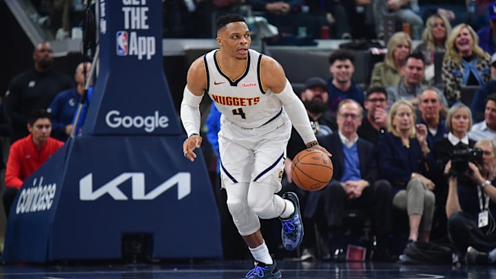 Apr 24, 2025; Inglewood, California, USA; Denver Nuggets guard Russell Westbrook (4) moves the ball up court against the Los Angeles Clippers during the first half of game three in the first round for the 2024 NBA Playoffs at Intuit Dome. Mandatory Credit: Gary A. Vasquez-Imagn Images Apr 24, 2025; Inglewood, California, USA; Denver Nuggets guard Russell Westbrook (4) moves the ball up court against the Los Angeles Clippers during the first half of game three in the first round for the 2024 NBA Playoffs at Intuit Dome. Mandatory Credit: Gary A. Vasquez-Imagn Images