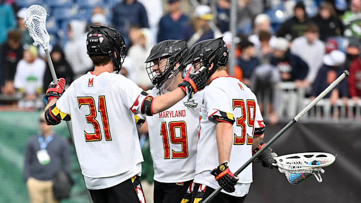 May 24, 2025; Foxborough, MA, USA; Maryland goalie Brian Ruppel (19) celebrates with midfielder Trace Davidson (31) and defender Peter Laake (39) after defeating Syracuse in the NCAA Men's Lacrosse Championship Semifinal at Gillette Stadium.