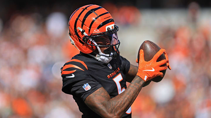 Cincinnati Bengals wide receiver Tee Higgins (5) celebrates after scoring a touchdown during the second quarter against the New York Jets at Paycor Stadium. 