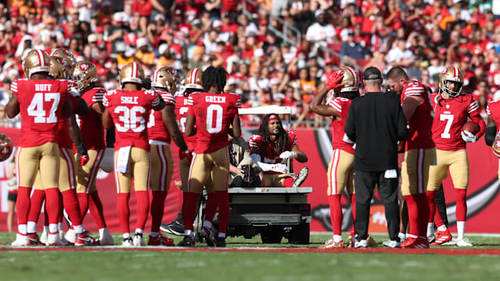 Oct 12, 2025; Tampa, Florida, USA; San Francisco 49ers middle linebacker Fred Warner (54) is carted off the field during the first quarter against the Tampa Bay Buccaneers at Raymond James Stadium. Mandatory Credit: Nathan Ray Seebeck-Imagn Images Oct 12, 2025; Tampa, Florida, USA; San Francisco 49ers middle linebacker Fred Warner (54) is carted off the field during the first quarter against the Tampa Bay Buccaneers at Raymond James Stadium. Mandatory Credit: Nathan Ray Seebeck-Imagn Images