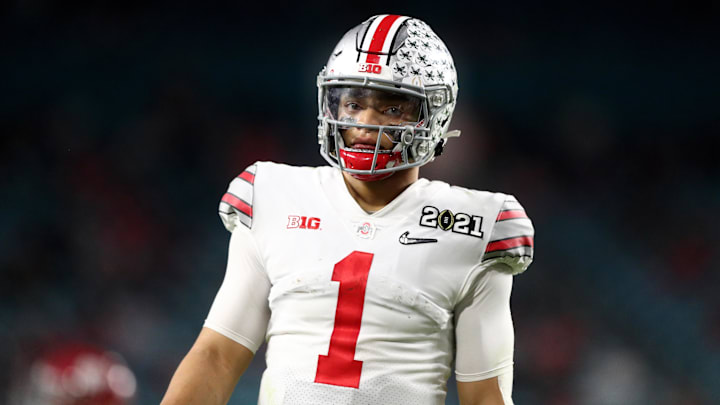 Jan 11, 2021; Miami Gardens, Florida, USA; Ohio State Buckeyes quarterback Justin Fields (1) against the Alabama Crimson Tide in the 2021 CFP National Championship Game. Jan 11, 2021; Miami Gardens, Florida, USA; Ohio State Buckeyes quarterback Justin Fields (1) against the Alabama Crimson Tide in the 2021 CFP National Championship Game.