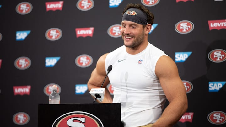 Jul 23, 2025; Santa Clara, CA, USA; San Francisco 49ers defensive end Nick Bosa answers questions from reporters following the first day of training camp at SAP Performance Facility. Mandatory Credit: D. Ross Cameron-Imagn Images
