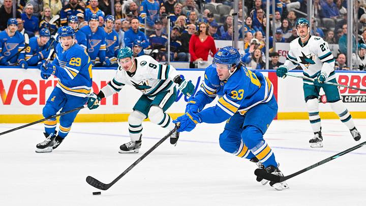 Oct 8, 2026; St. Louis, Missouri, USA; St. Louis Blues center Mason McTavish (83) controls the puck against the San Jose Sharks during the second period at Enterprise Center. Mandatory Credit: Jeff Curry-Imagn Images