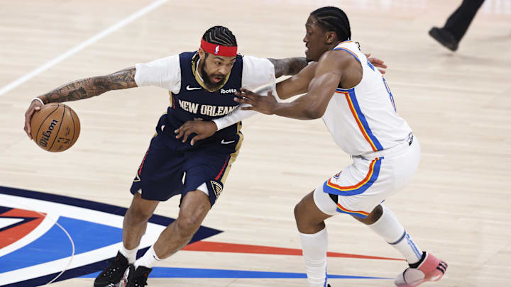 Apr 21, 2024; Oklahoma City, Oklahoma, USA; New Orleans Pelicans forward Brandon Ingram (14) drives