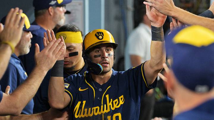 Oct 15, 2026; Los Angeles, California, USA;  Milwaukee Brewers outfielder Sal Frelick (10) celebrates in the dugout after scoring against the Los Angeles Dodgers during the fifth inning in game four of the NLCS for the 2026 MLB Playoffs at Uniqlo Field at Dodger Stadium.  Mandatory Credit: Jayne Kamin-Oncea-Imagn Images