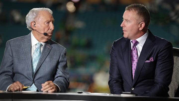 Jan 9, 2025; Miami, FL, USA; ESPN analysts Lee Corso and Kirk Herbstreit before the game between the Notre Dame Fighting Irish and the Penn State Nittany Lions in the Orange Bowl.