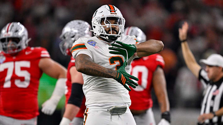 Dec 31, 2025; Arlington, TX, USA; Miami Hurricanes defensive lineman Akheem Mesidor (3) celebrates after he sacks Ohio State Buckeyes quarterback Julian Sayin (not pictured) during the 2025 Cotton Bowl and quarterfinal game of the College Football Playoff at AT&T Stadium. Mandatory Credit: Jerome Miron-Imagn Images