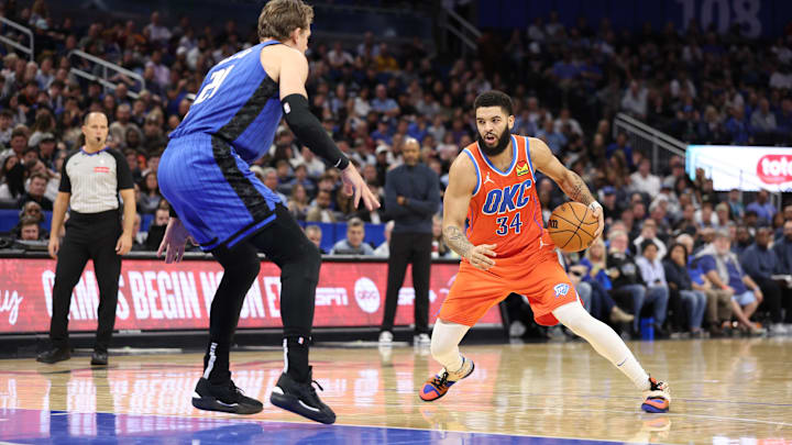 Dec 19, 2024; Orlando, Florida, USA; Oklahoma City Thunder forward Kenrich Williams (34) is guarded by Orlando Magic center Moritz Wagner (21) in the third quarter at Kia Center. Mandatory Credit: Nathan Ray Seebeck-Imagn Images Dec 19, 2024; Orlando, Florida, USA; Oklahoma City Thunder forward Kenrich Williams (34) is guarded by Orlando Magic center Moritz Wagner (21) in the third quarter at Kia Center. Mandatory Credit: Nathan Ray Seebeck-Imagn Images