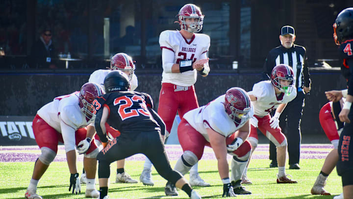 Carter Kuchenbuch led Okanogan to WIAA Class 2B football championships last fall over Napavine in Seattle. Carter Kuchenbuch led Okanogan to WIAA Class 2B football championships last fall over Napavine in Seattle.