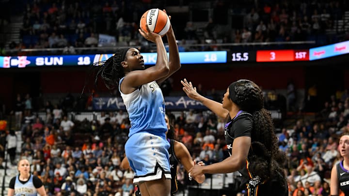 Aug 13, 2025; Uncasville, Connecticut, USA; Chicago Sky center Elizabeth Williams (1) shoots over Connecticut Sun forward Aneesah Morrow (24) during the first half at Mohegan Sun Arena. Mandatory Credit: Eric Canha-Imagn Images