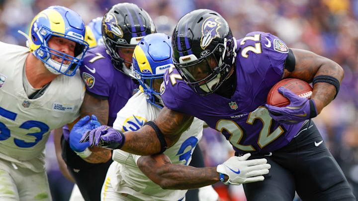 Oct 12, 2025; Baltimore, Maryland, USA; Los Angeles Rams safety Kam Curl (3) tackles Baltimore Ravens running back Derrick Henry (22) during the first quarter of the game at M&T Bank Stadium. Mandatory Credit: Peter Casey-Imagn Images