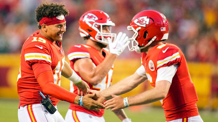 Aug 25, 2022; Kansas City, Missouri, USA; Kansas City Chiefs quarterback Patrick Mahomes (15) congratulates quarterback Shane Buechele (6) after a touchdown against the Green Bay Packers during the first half at GEHA Field at Arrowhead Stadium. Mandatory Credit: Jay Biggerstaff-Imagn Images