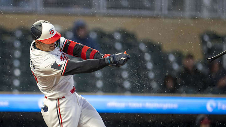 May 19, 2025; Minneapolis, Minnesota, USA; Minnesota Twins right fielder Carson McCusker (60) loses his bat during a swing against the Cleveland Guardians in the second inning at Target Field.