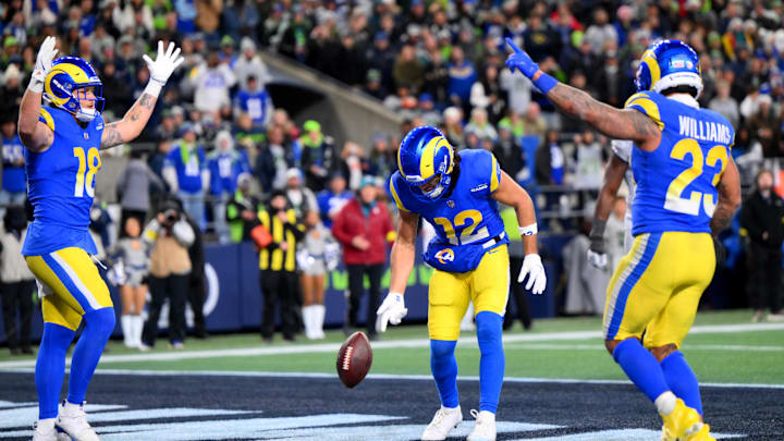 Dec 18, 2025; Seattle, Washington, USA; Los Angeles Rams wide receiver Puka Nacua (12) celebrates after scoring a touchdown against the Seattle Seahawks in the second half at Lumen Field. Mandatory Credit: Steven Bisig-Imagn Images