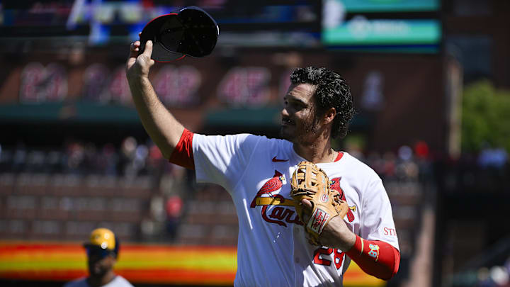 Sep 21, 2025; St. Louis, Missouri, USA; St. Louis Cardinals third baseman Nolan Arenado (28) salutes the fans after he was ceremonially removed before the start of the first inning against the Milwaukee Brewers at Busch Stadium. Mandatory Credit: Jeff Curry-Imagn Images
