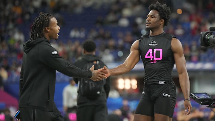 South Carolina DB Nick Emmanwori greets Texas CB Jahdae Barron during the 2025 NFL Combine at Lucas Oil Stadium.