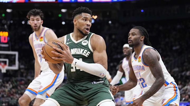 Jan 21, 2026; Milwaukee, Wisconsin, USA; Milwaukee Bucks forward Giannis Antetokounmpo (34) drives to the basket against Oklahoma City Thunder guard Cason Wallace (22) in the second half at Fiserv Forum. Mandatory Credit: Michael McLoone-Imagn Images Jan 21, 2026; Milwaukee, Wisconsin, USA; Milwaukee Bucks forward Giannis Antetokounmpo (34) drives to the basket against Oklahoma City Thunder guard Cason Wallace (22) in the second half at Fiserv Forum. Mandatory Credit: Michael McLoone-Imagn Images
