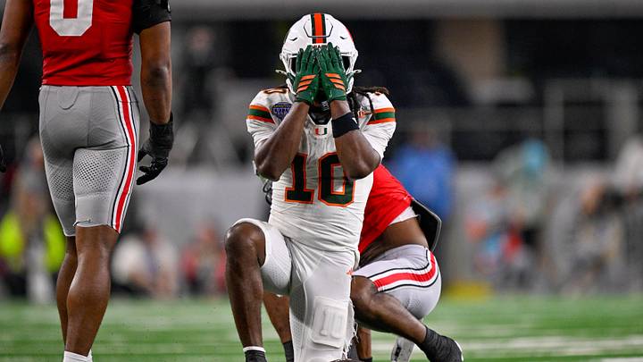 Dec 31, 2025; Arlington, TX, USA; Miami Hurricanes wide receiver Malachi Toney (10) covers his face during the 2025 Cotton Bowl and quarterfinal game of the College Football Playoff at AT&T Stadium. Mandatory Credit: Jerome Miron-Imagn Images