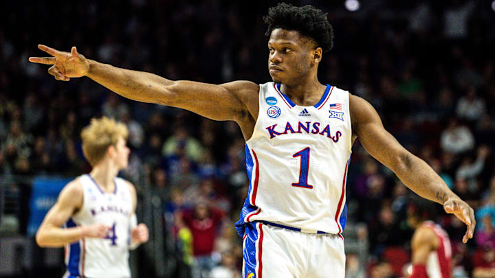 Kansas guard Joseph Yesufu (1) celebrates a 3-pointer