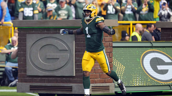 Sep 7, 2025; Green Bay, Wisconsin, USA; Green Bay Packers defensive end Micah Parsons (1) runs onto the field before the game against the Detroit Lions at Lambeau Field. Mandatory Credit: Jeff Hanisch-Imagn Images