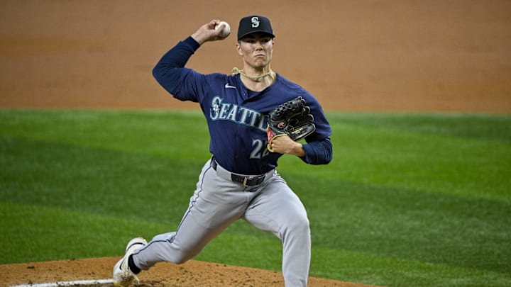 Sep 22, 2024; Arlington, Texas, USA; Seattle Mariners starting pitcher Bryan Woo (22) pitches against the Texas Rangers during the second inning at Globe Life Field. Mandatory Credit: Jerome Miron-Imagn Images Sep 22, 2024; Arlington, Texas, USA; Seattle Mariners starting pitcher Bryan Woo (22) pitches against the Texas Rangers during the second inning at Globe Life Field. Mandatory Credit: Jerome Miron-Imagn Images