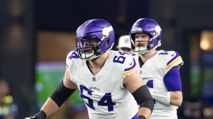 Jan 13, 2025; Glendale, AZ, USA; Minnesota Vikings guard Blake Brandel (64) blocks for quarterback Sam Darnold (14) against the Los Angeles Rams during an NFC wild card game at State Farm Stadium. Mandatory Credit: Mark J. Rebilas-Imagn Images Jan 13, 2025; Glendale, AZ, USA; Minnesota Vikings guard Blake Brandel (64) blocks for quarterback Sam Darnold (14) against the Los Angeles Rams during an NFC wild card game at State Farm Stadium. Mandatory Credit: Mark J. Rebilas-Imagn Images