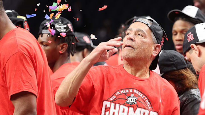 Mar 15, 2025; Kansas City, MO, USA; The Houston Cougars and head coach Kelvin Sampson react after defeating the Arizona Wildcats in the Big 12 Conference Tournament Championship game at T-Mobile Center. Mandatory Credit: William Purnell-Imagn Images