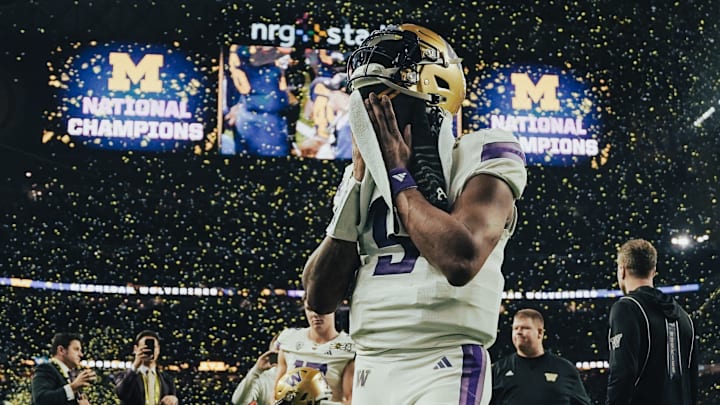 Michael Penix Jr. leaves the field after losing to No. 1 Michigan 34-13. Michael Penix Jr. leaves the field after losing to No. 1 Michigan 34-13.