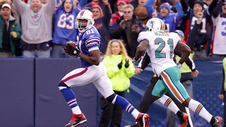 Nov 29, 2009; Orchard Park, NY, USA; Buffalo Bills wide receiver Terrell Owens (81) catches a 51 yard pass and runs for a touchdown against the Miami Dolphins late in the 4th quarter at Ralph Wilson Stadium. Nov 29, 2009; Orchard Park, NY, USA; Buffalo Bills wide receiver Terrell Owens (81) catches a 51 yard pass and runs for a touchdown against the Miami Dolphins late in the 4th quarter at Ralph Wilson Stadium.