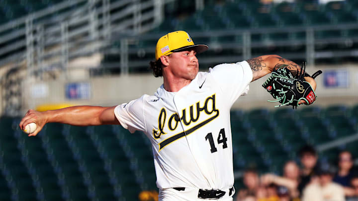 Brody Brecht (14) of Iowa throws strikes as the Florida International University Panthers play the Iowa Hawkeyes in a three-game series at Principal Park in Des Moines on Thursday, May 16, 2024.