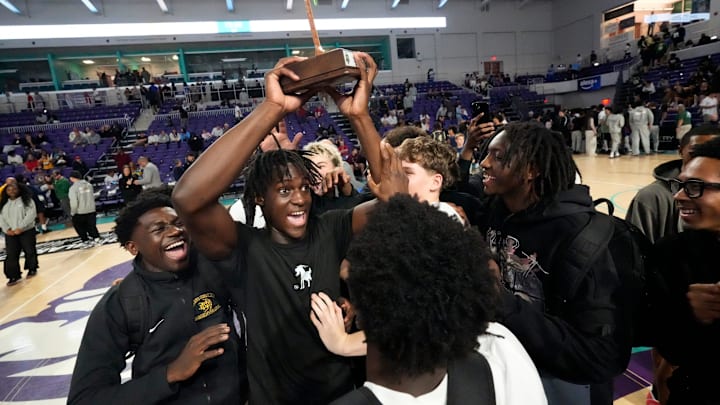 Notre Dame senior Abdou Toure (middle), Gatorade Connecticut Boys Basketball Player of the Year, won the Edison National Bank Slam Dunk Championship on Dec. 21, 2025, at Suncoast Credit Union Arena in Fort Myers, Florida. The event was part of the GEICO City of Palms Classic basketball tournament. Notre Dame senior Abdou Toure (middle), Gatorade Connecticut Boys Basketball Player of the Year, won the Edison National Bank Slam Dunk Championship on Dec. 21, 2025, at Suncoast Credit Union Arena in Fort Myers, Florida. The event was part of the GEICO City of Palms Classic basketball tournament.