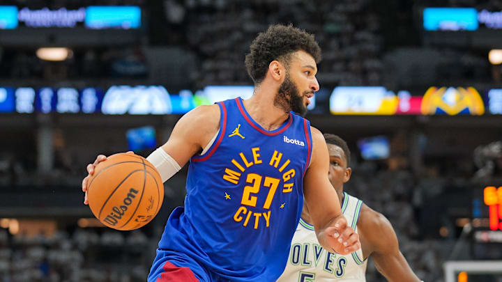 May 16, 2024; Minneapolis, Minnesota, USA; Denver Nuggets guard Jamal Murray (27) dribbles against May 16, 2024; Minneapolis, Minnesota, USA; Denver Nuggets guard Jamal Murray (27) dribbles against