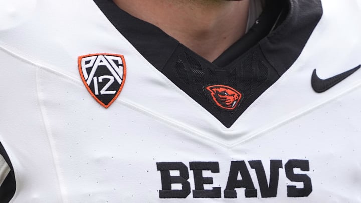Oct 26, 2024; Berkeley, California, USA; A view of the Pac-12 logo on the jersey of Oregon State Beavers punter Josh Green (37) during the second quarter against the California Golden Bears at California Memorial Stadium. Mandatory Credit: Darren Yamashita-Imagn Images Oct 26, 2024; Berkeley, California, USA; A view of the Pac-12 logo on the jersey of Oregon State Beavers punter Josh Green (37) during the second quarter against the California Golden Bears at California Memorial Stadium. Mandatory Credit: Darren Yamashita-Imagn Images